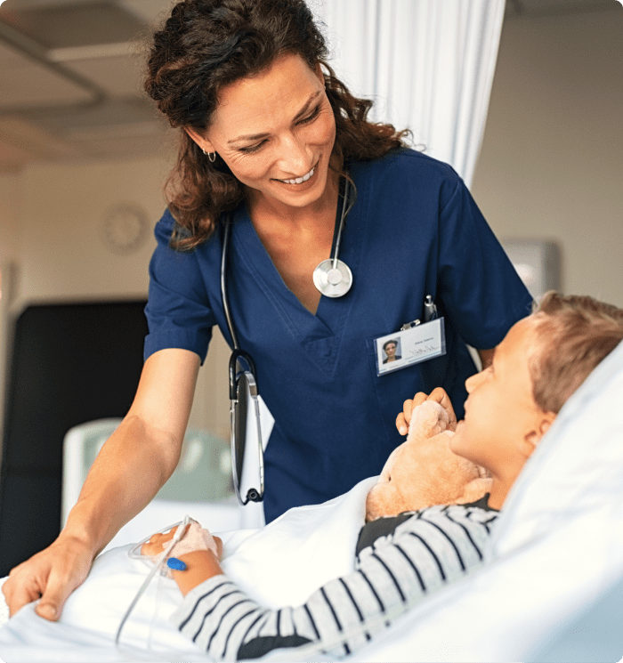 doctor smiling at child patient